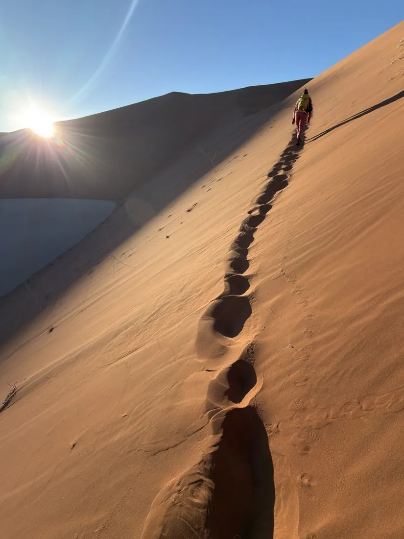 Footprints along the knife-edge ridge of a red dune near Sossusvlei